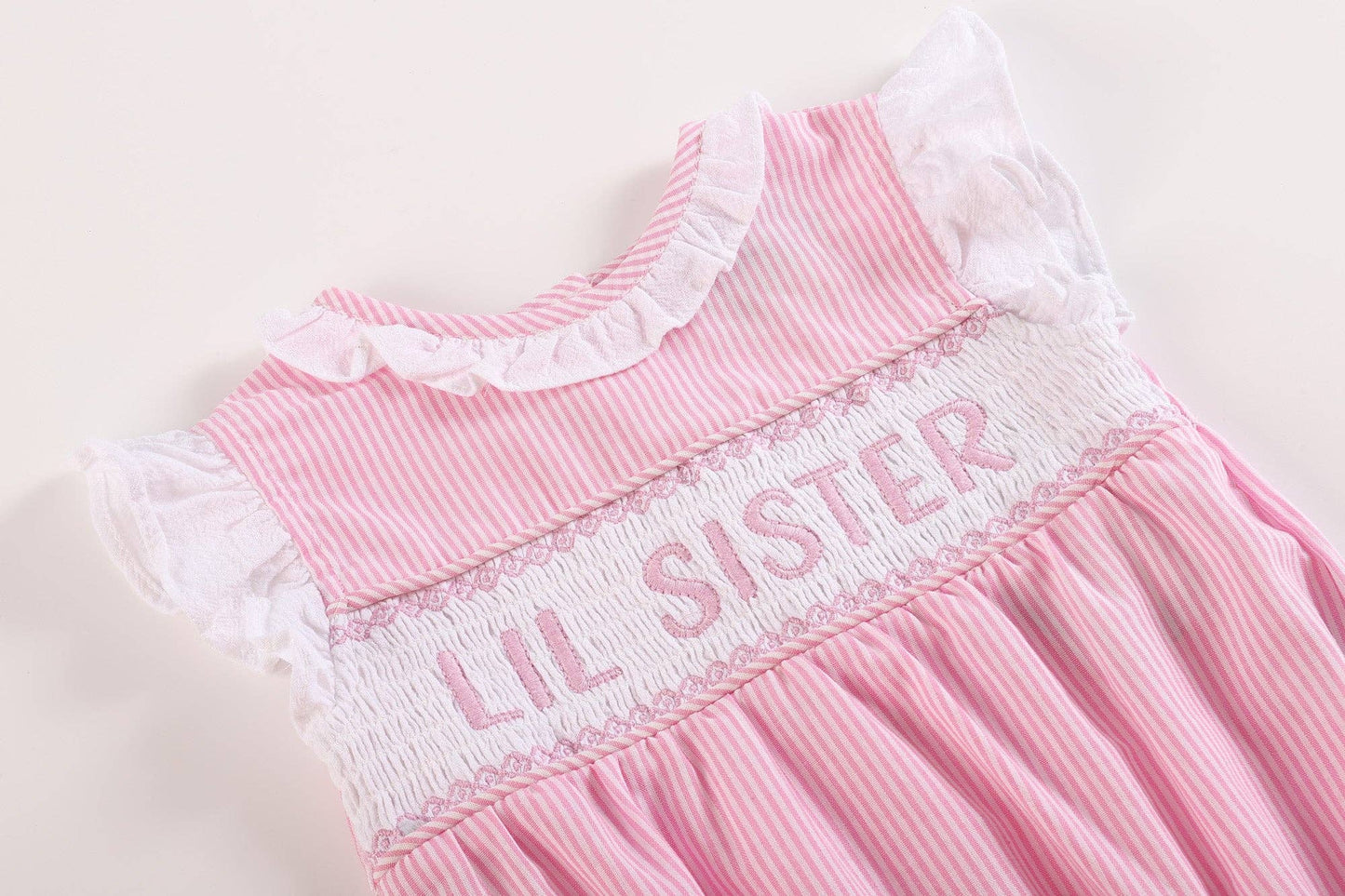 Pink Striped Lil Sis Smocked Romper