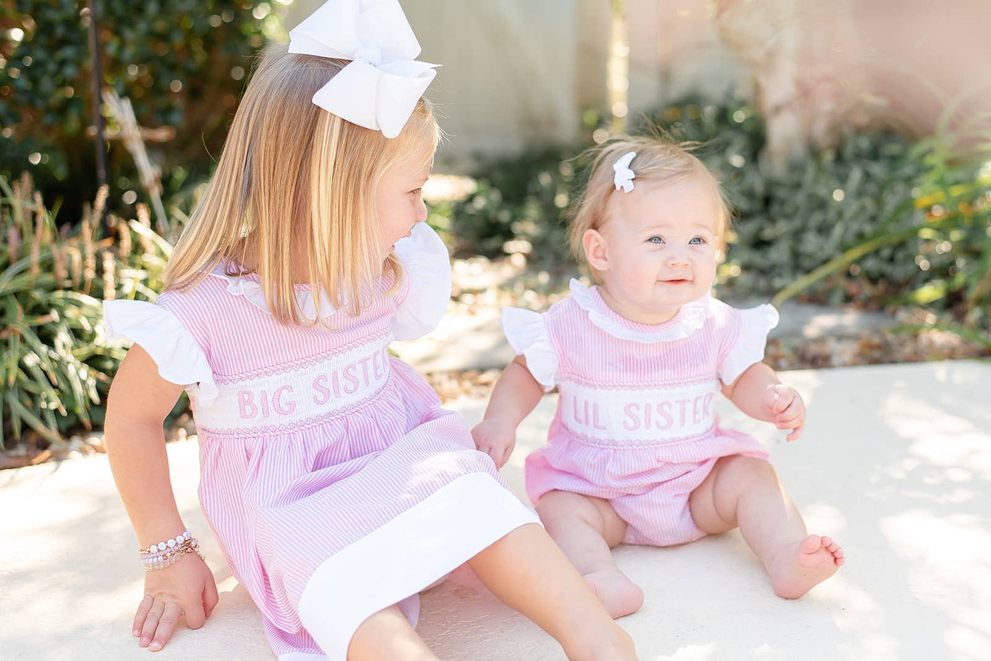 Pink Striped Lil Sis Smocked Romper