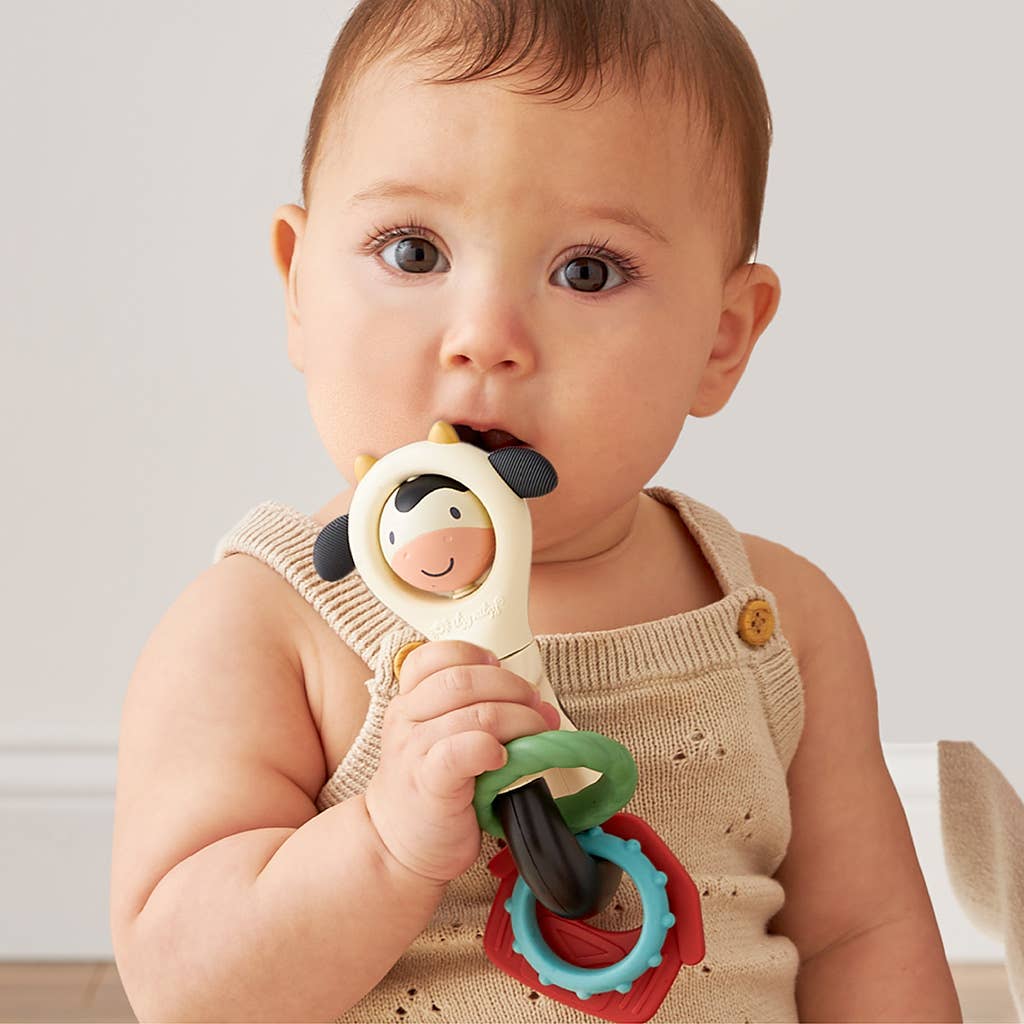 Itzy Spinner Teething Rattle Cow